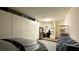 Well-organized garage space with plenty of storage cabinets, and a parked car with ample open area at 2050 W Warm Springs Rd # 4211, Henderson, NV 89014