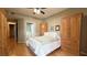 Main bedroom featuring hardwood floors and dual wardrobes with ample storage space at 2050 W Warm Springs Rd # 4211, Henderson, NV 89014