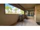 Enclosed outdoor patio offers plenty of sunlight and space for home exercise equipment, with nice views of the community at 2050 W Warm Springs Rd # 4211, Henderson, NV 89014