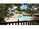 Inviting swimming pool area with stylish lounging and palm trees at 2050 W Warm Springs Rd # 4211, Henderson, NV 89014