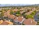 Picturesque aerial view of a residential community with well-kept homes, mature trees, and a tranquil atmosphere at 2124 Rising Mist St, Las Vegas, NV 89134