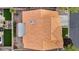 Aerial view of a roof featuring clay tiles, landscaping, and an outdoor living area at 2124 Rising Mist St, Las Vegas, NV 89134