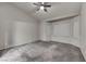 Bright bedroom with bay windows, neutral walls, and plush carpeting at 2124 Rising Mist St, Las Vegas, NV 89134