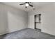 Bedroom with ceiling fan, carpet flooring, and a closet at 2124 Rising Mist St, Las Vegas, NV 89134