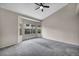 Bright and spacious bedroom with neutral walls and plush carpeting at 2124 Rising Mist St, Las Vegas, NV 89134