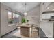 Dining area with table, chairs, lighting, and view at 2124 Rising Mist St, Las Vegas, NV 89134