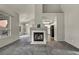 Bright living room with fireplace and gray carpeting at 2124 Rising Mist St, Las Vegas, NV 89134