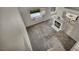 Open floor plan with a cozy fireplace, large windows, and a glimpse of the kitchen at 2124 Rising Mist St, Las Vegas, NV 89134