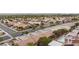 Aerial view of houses featuring neighborhood streets, mature trees, and swimming pools at 2231 Hallston St, Las Vegas, NV 89134