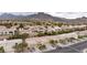 Wide aerial view capturing the roof, tile roofing, and the mountainous neighborhood at 2231 Hallston St, Las Vegas, NV 89134