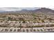 Expansive aerial view of the residential area with golf course and mountain views at 2231 Hallston St, Las Vegas, NV 89134