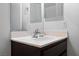 Bright bathroom vanity with marble countertop, mirror and updated fixtures at 2231 Hallston St, Las Vegas, NV 89134