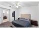 Cozy bedroom features carpet, closet, ceiling fan and natural light from windows at 2231 Hallston St, Las Vegas, NV 89134