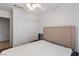 Simple bedroom features neutral decor, carpet, and a sliding-door closet at 2231 Hallston St, Las Vegas, NV 89134