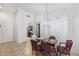 Bright dining area featuring tile flooring and a view into the kitchen at 2231 Hallston St, Las Vegas, NV 89134