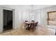 Bright dining area featuring a decorative chandelier and access to the backyard at 2231 Hallston St, Las Vegas, NV 89134