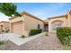 A charming one-story house with a well-kept yard and a two-car garage at 2231 Hallston St, Las Vegas, NV 89134