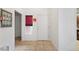 Bright foyer showcasing tile flooring, neutral wall paint, and entryway door at 2231 Hallston St, Las Vegas, NV 89134
