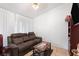 Comfortable living room with a plush couch and a decorative coffee table at 2231 Hallston St, Las Vegas, NV 89134