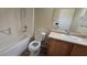 This bathroom has tile floors, a vanity and sink, a toilet, and a shower-tub combo at 2737 Rimbaud St, Henderson, NV 89044