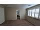 This bedroom features neutral walls, carpet, and a door to the bathroom and closet, and shutter blinds at 2737 Rimbaud St, Henderson, NV 89044