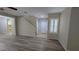 Open foyer featuring tile entry, wood flooring, staircase, and a shuttered window at 2737 Rimbaud St, Henderson, NV 89044