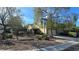 Well-maintained home with desert landscaping and a spacious driveway near the Rimbaud street sign at 2737 Rimbaud St, Henderson, NV 89044