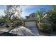 Beautiful two-story home with well-maintained landscaping, a driveway and a two-car garage at 2737 Rimbaud St, Henderson, NV 89044