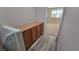 This hallway features laminate floors and a built-in cabinet for extra storage at 2737 Rimbaud St, Henderson, NV 89044