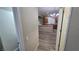 View of the main living area with wood flooring, kitchen, and recessed lighting at 2737 Rimbaud St, Henderson, NV 89044