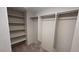 Spacious walk-in closet with built-in shelving and ample storage space at 2737 Rimbaud St, Henderson, NV 89044