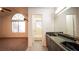 Bright bathroom features a dual sink vanity and separate toilet and shower room at 3217 Symphony Dr, Las Vegas, NV 89146