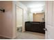 Bright bathroom features a dual sink vanity and separate toilet and shower room at 3217 Symphony Dr, Las Vegas, NV 89146
