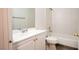 Clean bathroom features white vanity and updated finishes at 3217 Symphony Dr, Las Vegas, NV 89146