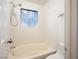 Clean bathtub and tile shower area with window at 3217 Symphony Dr, Las Vegas, NV 89146