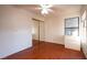 Bedroom featuring dark floors, closet and window at 3217 Symphony Dr, Las Vegas, NV 89146