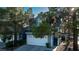 Charming two-story home with a white garage door and light blue exterior with mature landscaping at 3217 Symphony Dr, Las Vegas, NV 89146
