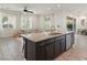 Island kitchen open to a living space and dining space at 3218 Mura Del Prato Ave, Henderson, NV 89044