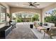 Covered patio perfect for outdoor entertaining, featuring comfortable seating and a built-in grill at 3218 Mura Del Prato Ave, Henderson, NV 89044