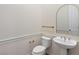 Elegant powder room featuring modern fixtures and a pedestal sink at 3218 Mura Del Prato Ave, Henderson, NV 89044