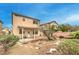 View of the backyard featuring a covered patio and greenery at 3448 Quiet Pueblo St, North Las Vegas, NV 89032