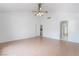 Large open bedroom with ceiling fan and easy access to other rooms at 3594 Wild Cherry Ct, Las Vegas, NV 89121