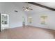 Spacious bedroom featuring high ceilings with decorative beams and tile flooring at 3594 Wild Cherry Ct, Las Vegas, NV 89121