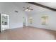 Spacious bedroom featuring high ceilings with decorative beams and tile flooring at 3594 Wild Cherry Ct, Las Vegas, NV 89121