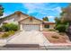 Charming single-story home featuring a well-maintained lawn and a spacious two-car garage at 3594 Wild Cherry Ct, Las Vegas, NV 89121