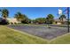 Community basketball court with mature trees and well-maintained landscaping in a desirable neighborhood at 3642 Haverhill St, Las Vegas, NV 89121