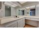 Bathroom with a large mirror, vanity, and access to an ensuite at 3642 Haverhill St, Las Vegas, NV 89121