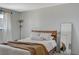 Stylish bedroom with soft carpet and natural light from the windows at 3642 Haverhill St, Las Vegas, NV 89121