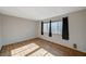 Bedroom featuring wood-look flooring and windows providing lots of light at 3642 Haverhill St, Las Vegas, NV 89121