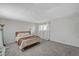Well-lit bedroom with soft carpet and a peaceful atmosphere at 3642 Haverhill St, Las Vegas, NV 89121